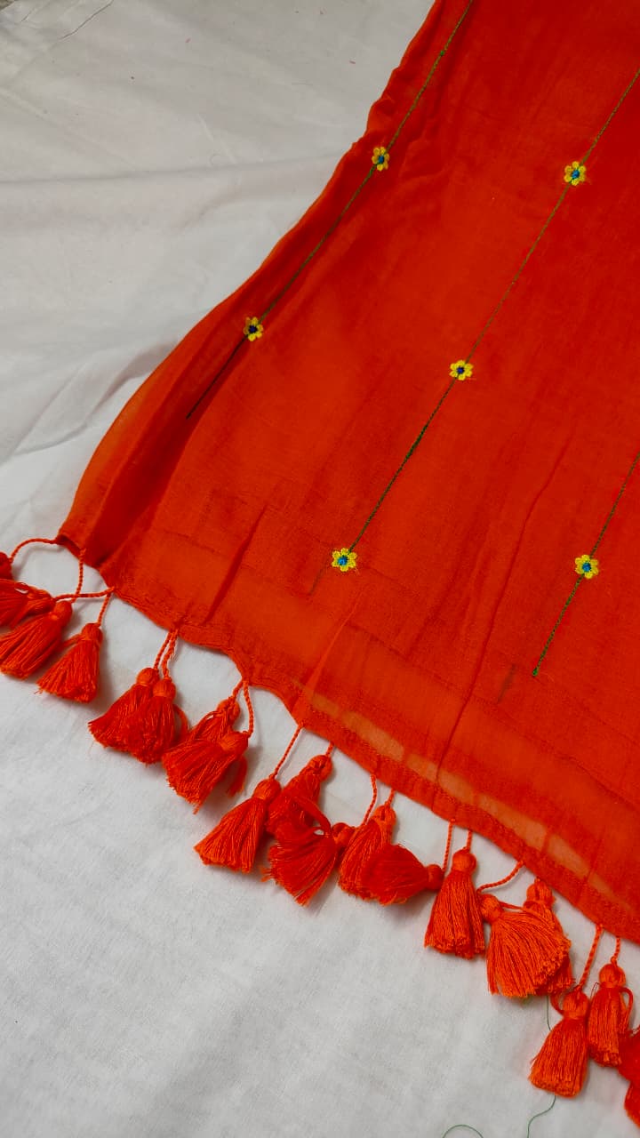 Marigold Lines — Orange Saree with Floral Butis & Tassel Border - Image 3